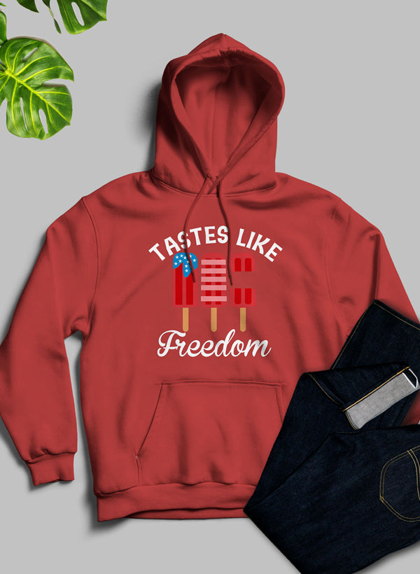 A stylish Tastes Like Freedom Hoodie featuring unique artistic designs, made from cozy fleece blend material with an adjustable hood.