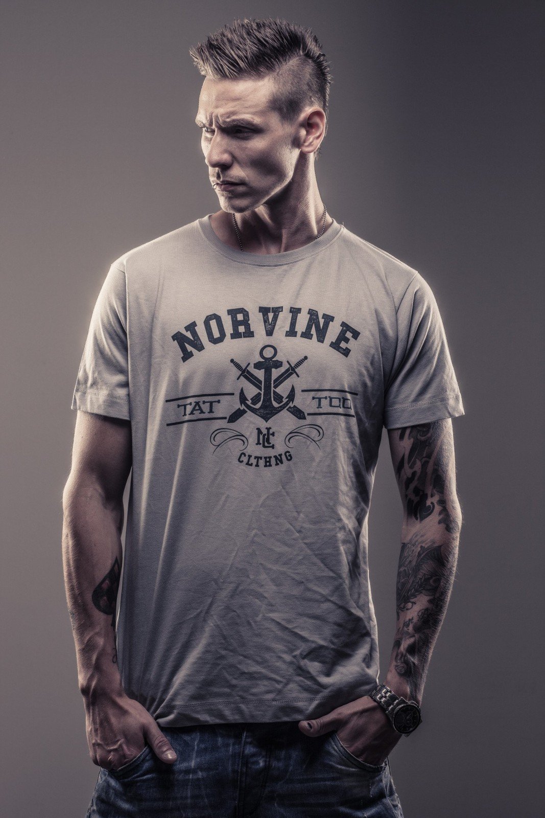 Grey premium quality Tattoo Anchor T-Shirt by Norvine featuring a stylish logo on the back, made from 100% combed cotton.