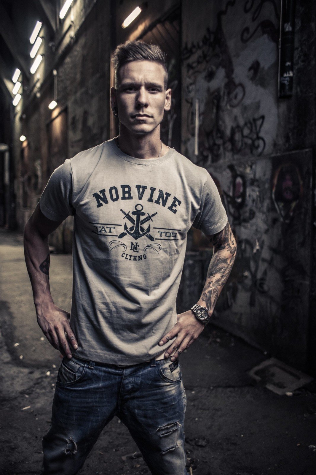 Grey premium quality Tattoo Anchor T-Shirt by Norvine featuring a stylish logo on the back, made from 100% combed cotton.