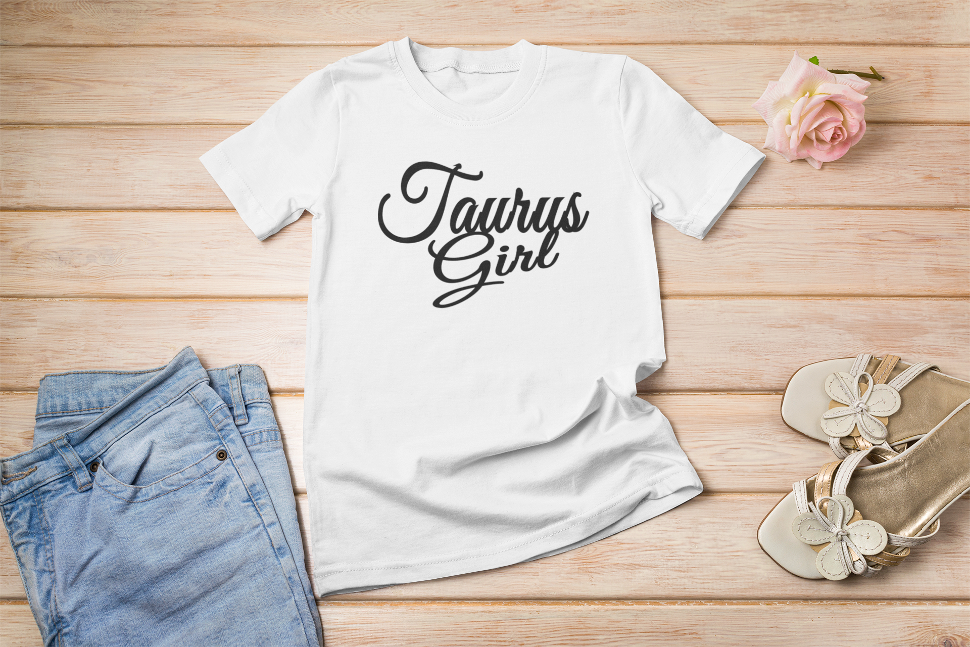 A stylish unisex Taurus Girl Lettering T-shirt featuring bold zodiac lettering on a comfortable fabric.