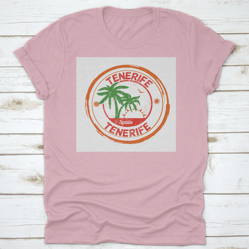 A stylish T-shirt featuring a beautiful sunrise view of Tenerife, showcasing vibrant colors and a comfortable fit.