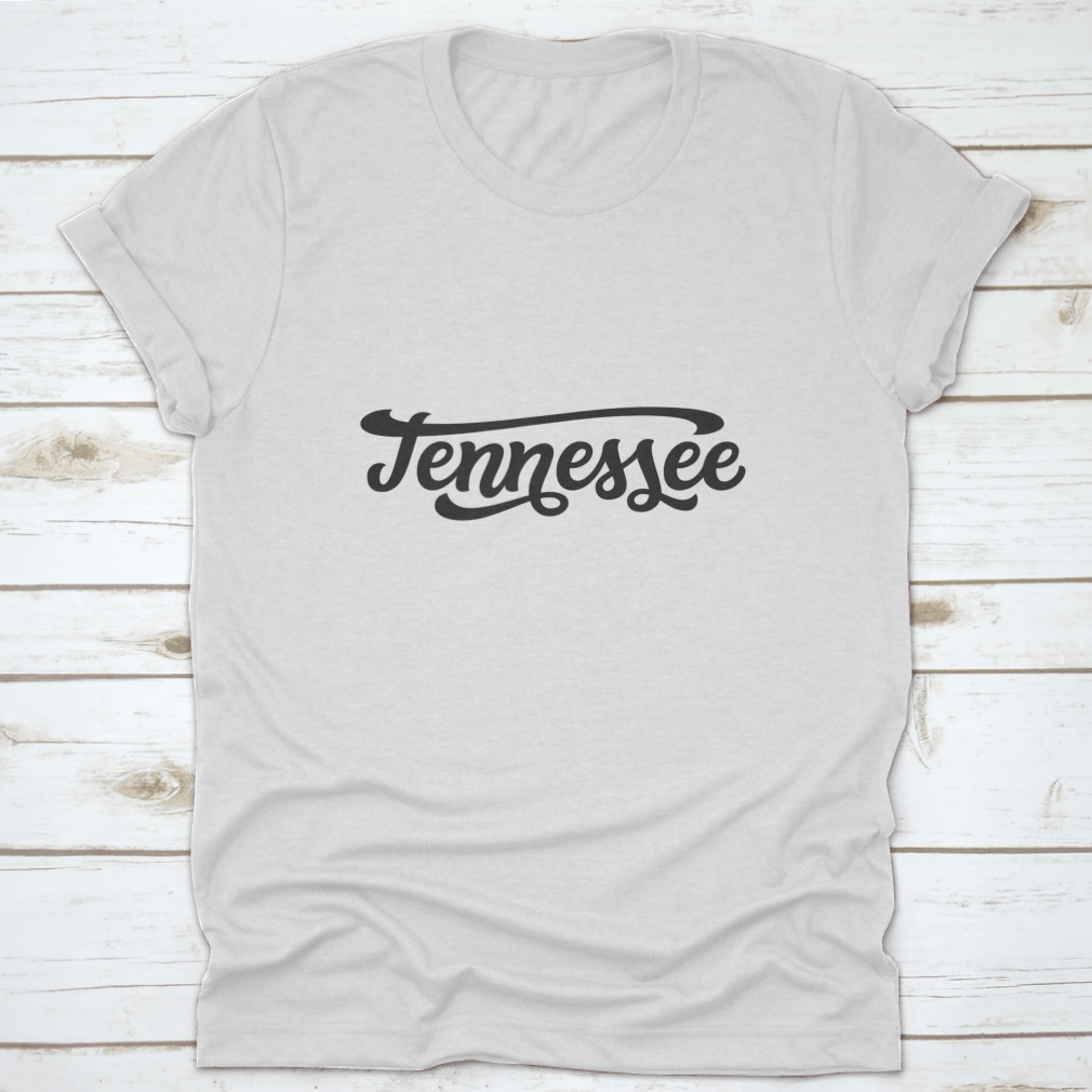 A hand-drawn design of the state name Tennessee on a white background, featured on a comfortable cotton T-shirt.