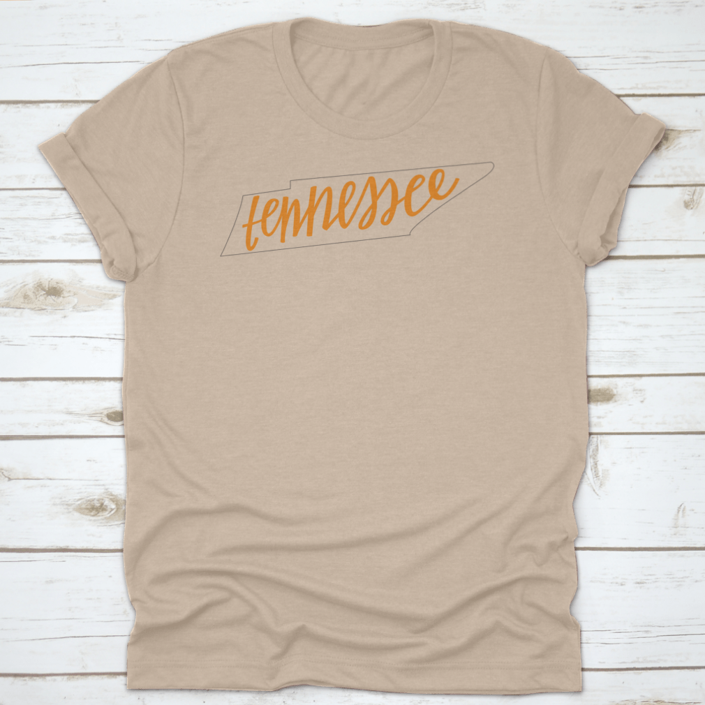 A trendy Tennessee State Outline T-Shirt featuring hand-lettering design, made from soft cotton fabric.