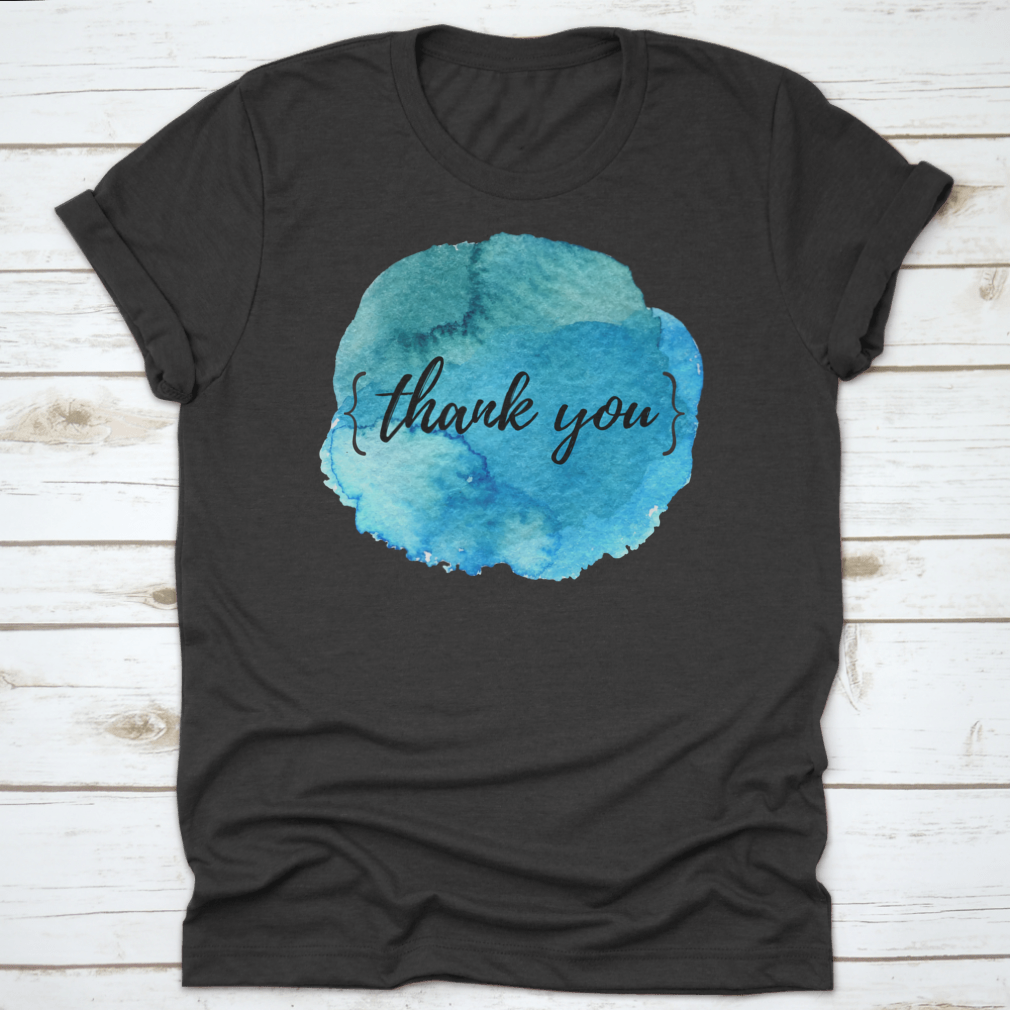 A stylish cotton t-shirt featuring a watercolor circle spot design with an inspirational quote, perfect for motivation.