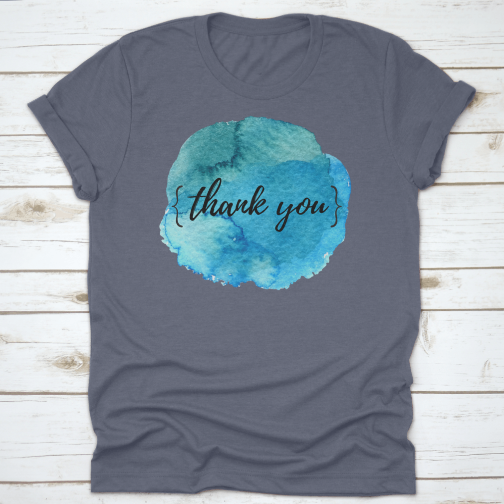 A stylish cotton t-shirt featuring a watercolor circle spot design with an inspirational quote, perfect for motivation.