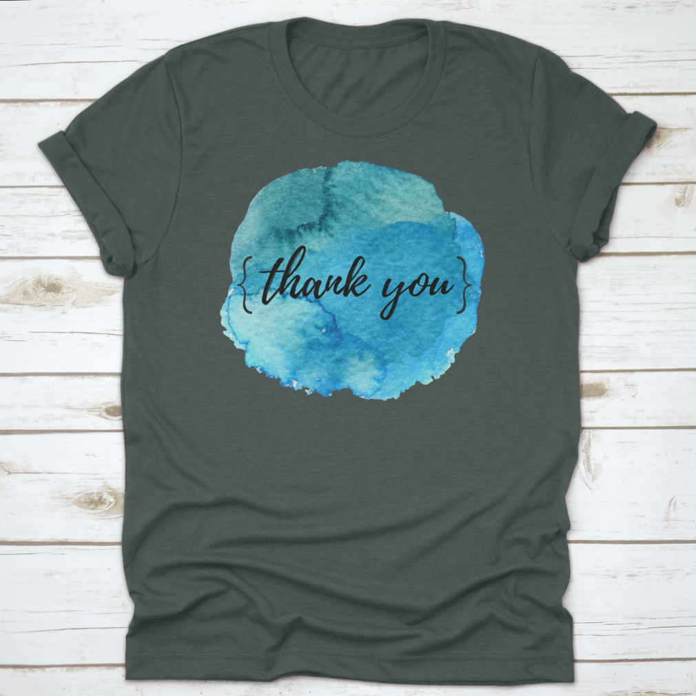 A stylish cotton t-shirt featuring a watercolor circle spot design with an inspirational quote, perfect for motivation.