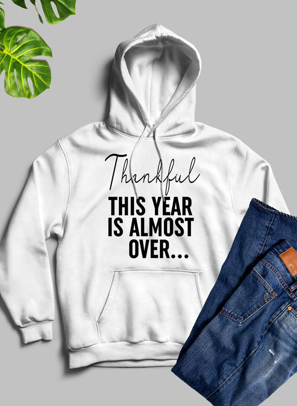 A cozy hoodie featuring a unique artistic design that expresses gratitude, made from a warm fleece blend with an adjustable hood.