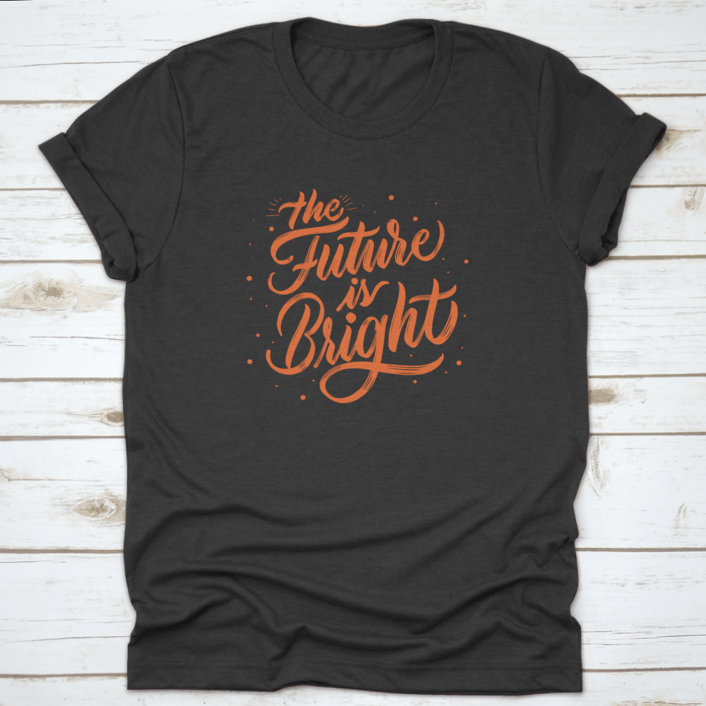 A stylish T-shirt featuring modern calligraphy that reads 'The Future Is Bright', made from soft cotton fabric.