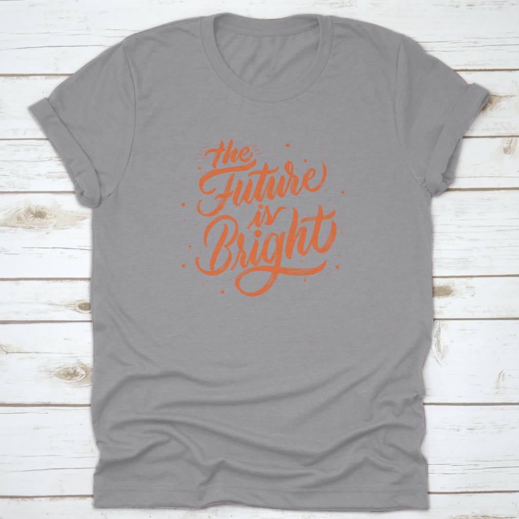 A stylish T-shirt featuring modern calligraphy that reads 'The Future Is Bright', made from soft cotton fabric.