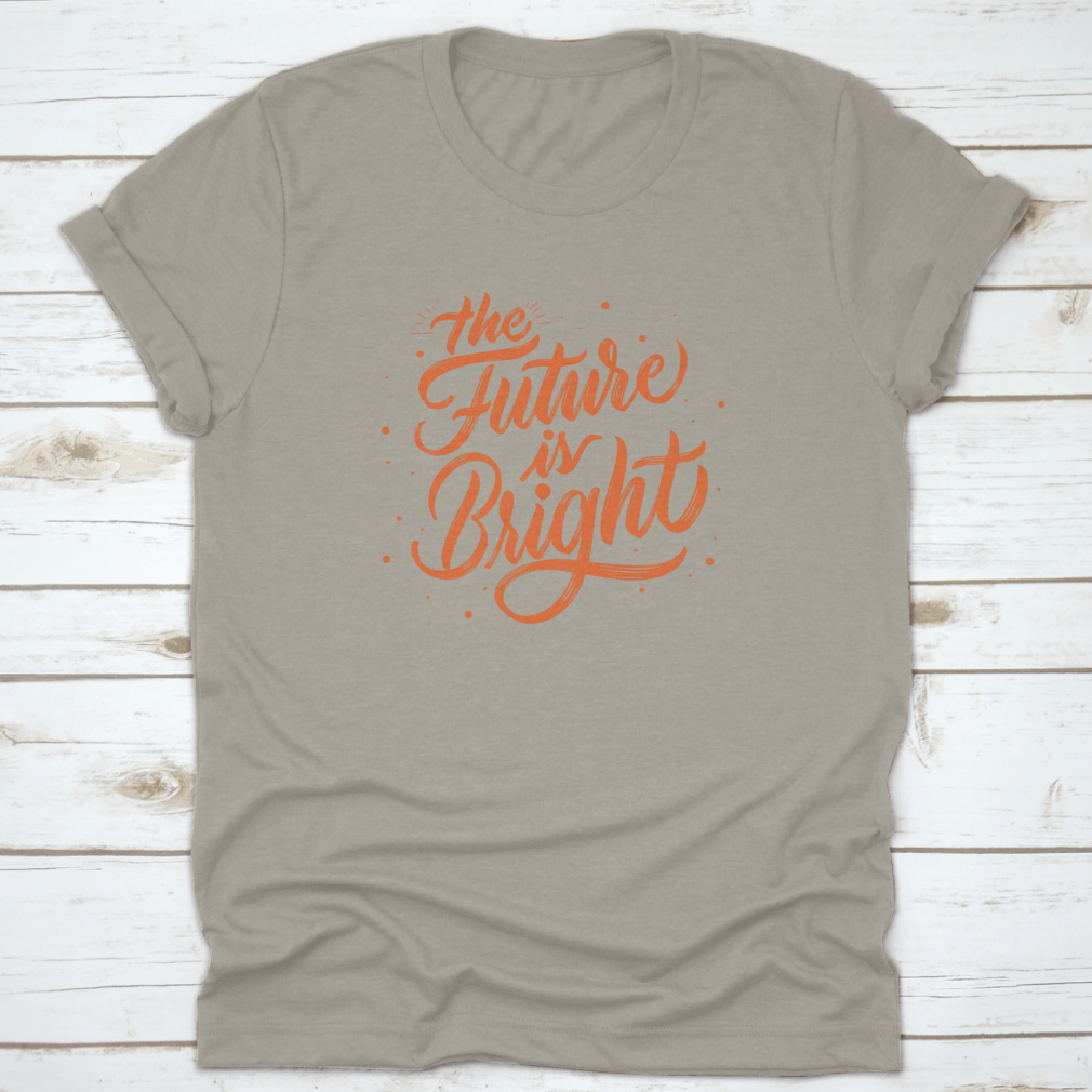 A stylish T-shirt featuring modern calligraphy that reads 'The Future Is Bright', made from soft cotton fabric.