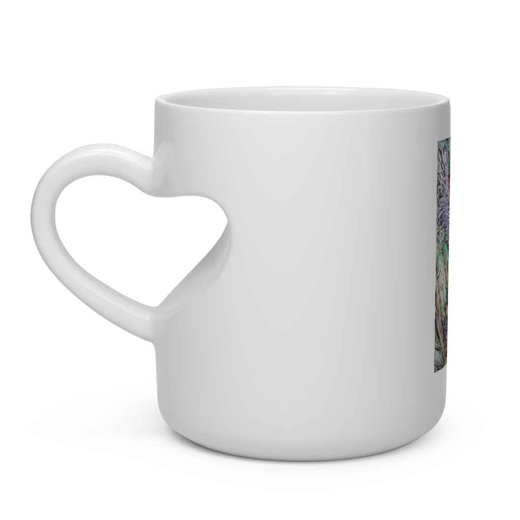 A white ceramic heart-shaped mug with a heart-shaped handle, perfect for hot beverages.