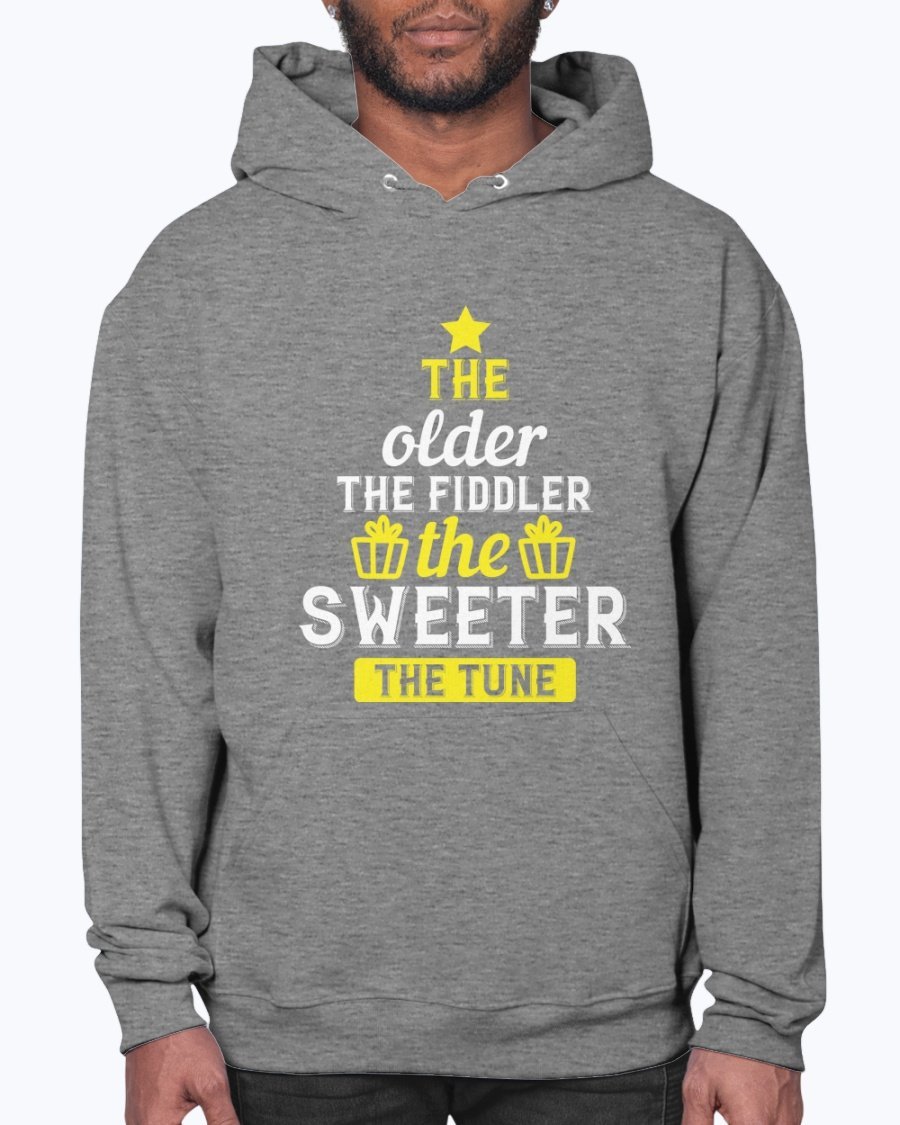 A cozy unisex hoodie featuring the phrase 'The older the fiddler, the sweeter the tune' designed for birthdays, made from soft fleece material.