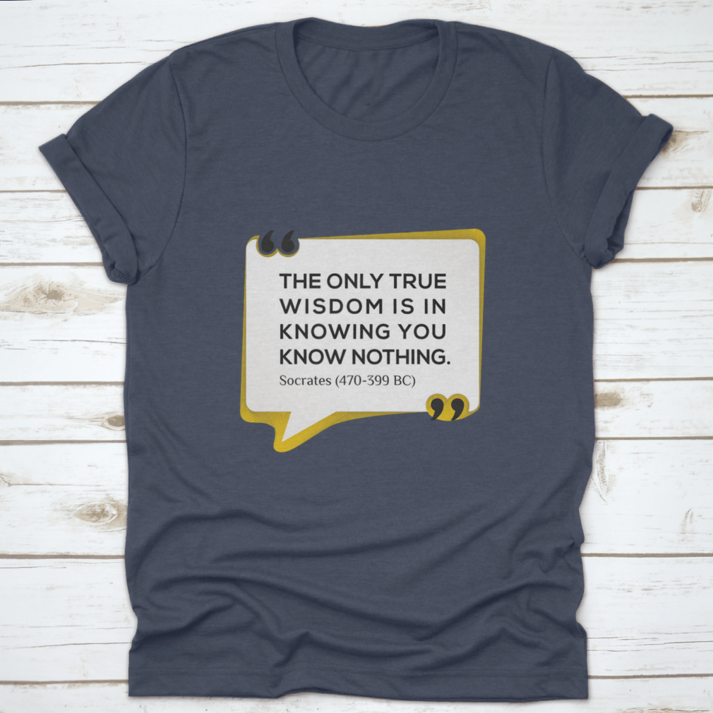 Inspirational T-shirt featuring the quote 'The Only True Wisdom Is In Knowing You Know Nothing', made from 100% cotton, displayed on a neutral background.