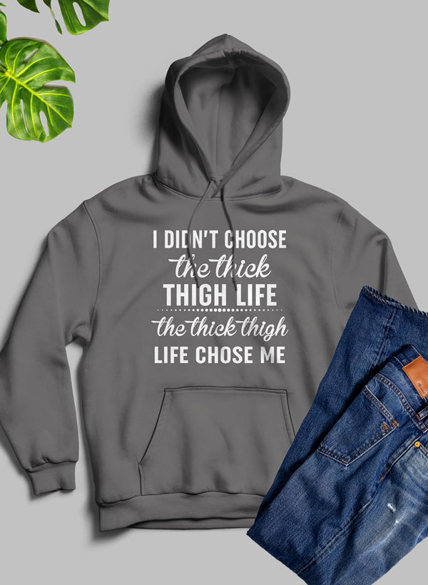 The Thick Thigh Life Hoodie featuring a cozy fleece blend, adjustable hood, and stylish design by top artists.