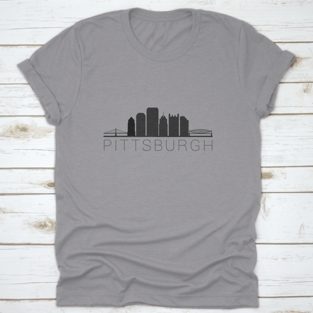 A stylish t-shirt featuring a skyline silhouette of a city, showcasing iconic landmarks in a modern design.