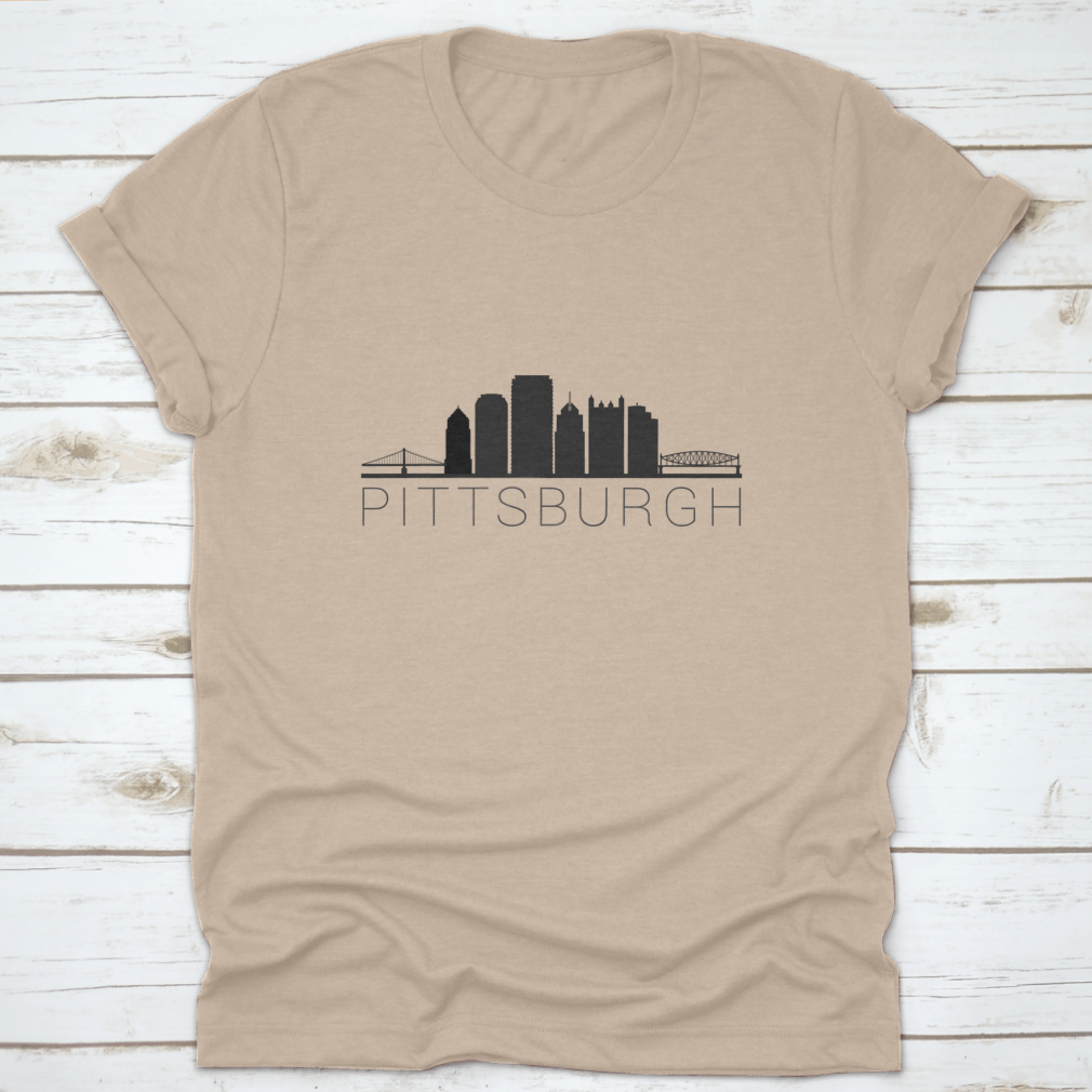 A stylish t-shirt featuring a skyline silhouette of a city, showcasing iconic landmarks in a modern design.