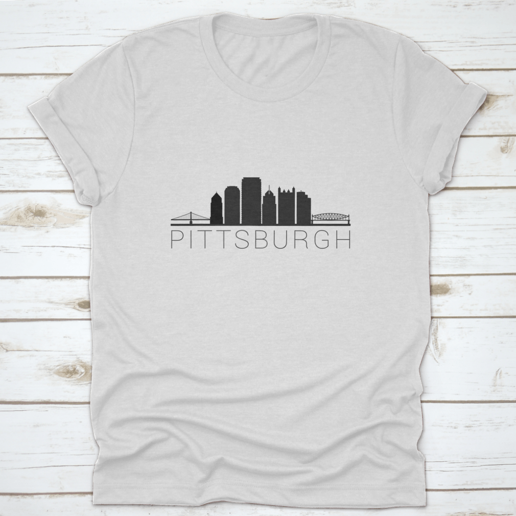 A stylish t-shirt featuring a skyline silhouette of a city, showcasing iconic landmarks in a modern design.