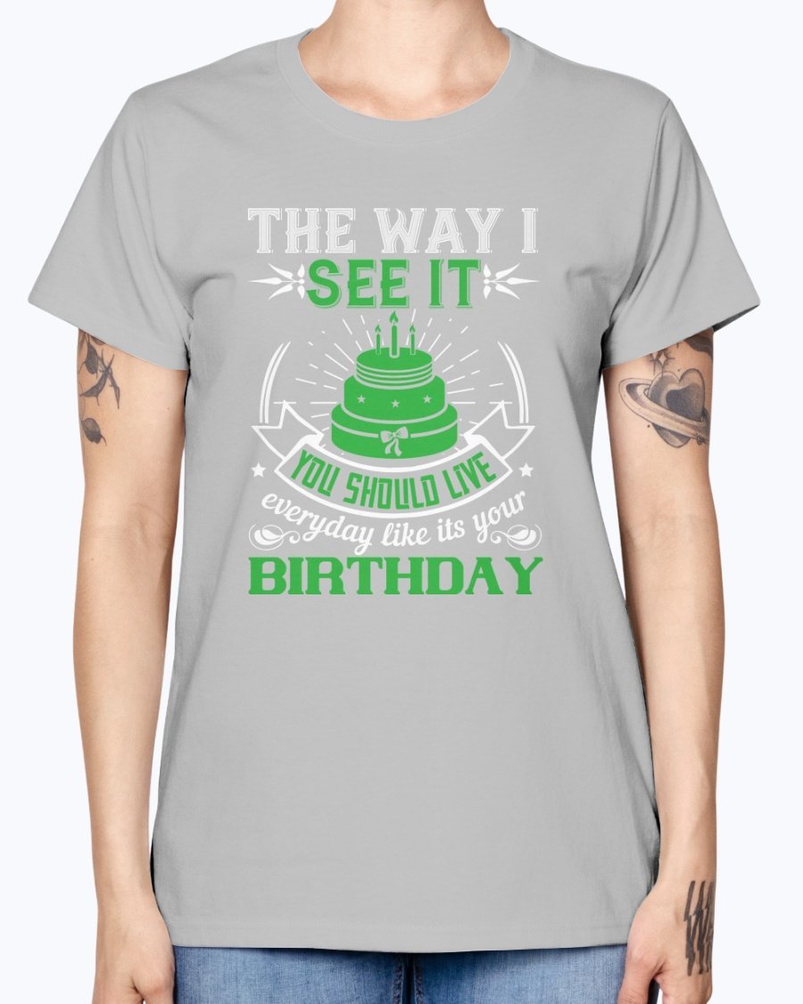 A stylish Missy T-Shirt featuring the phrase 'Live Every Day Like It's Your Birthday' in vibrant colors, made from soft preshrunk cotton.