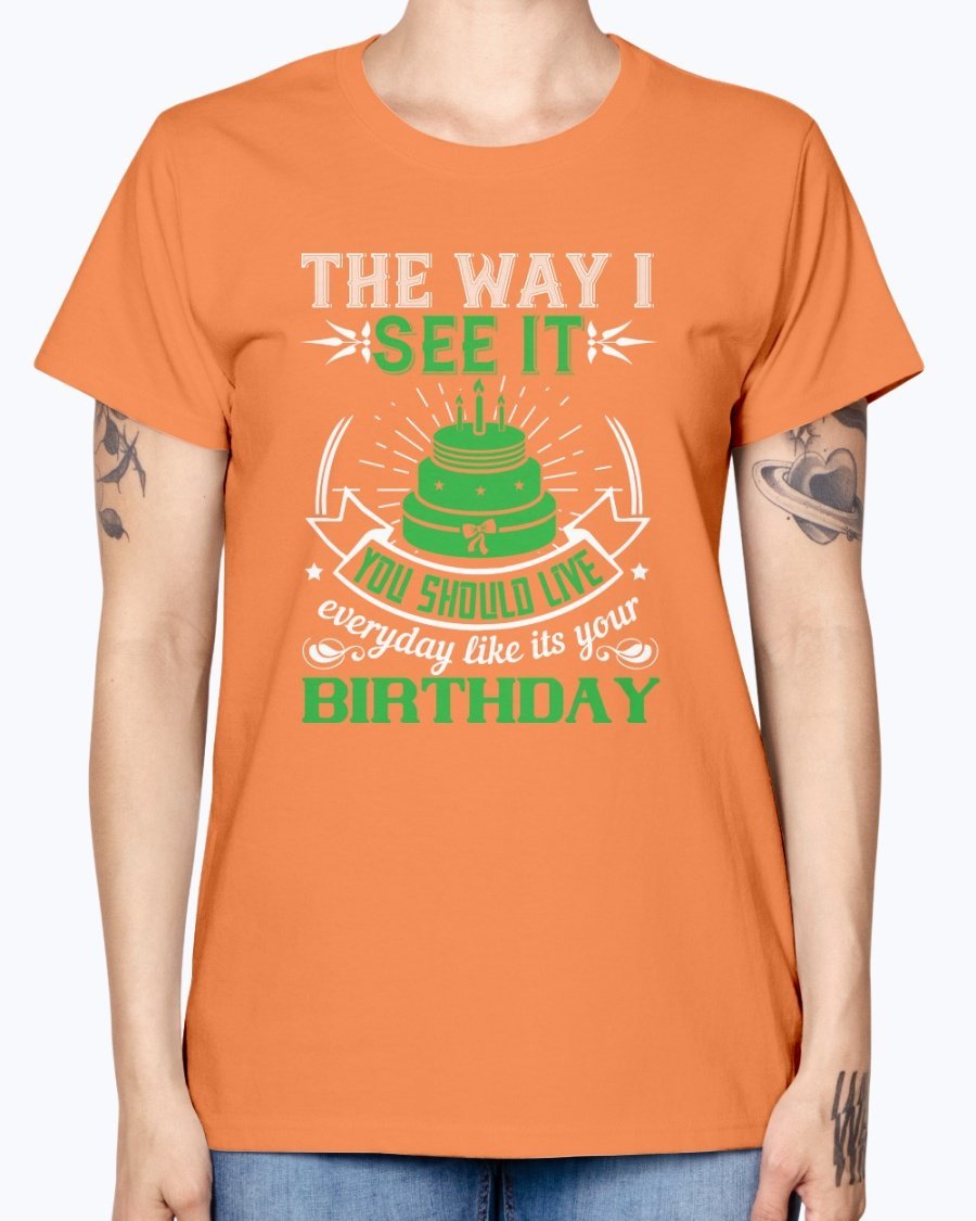 A stylish Missy T-Shirt featuring the phrase 'Live Every Day Like It's Your Birthday' in vibrant colors, made from soft preshrunk cotton.