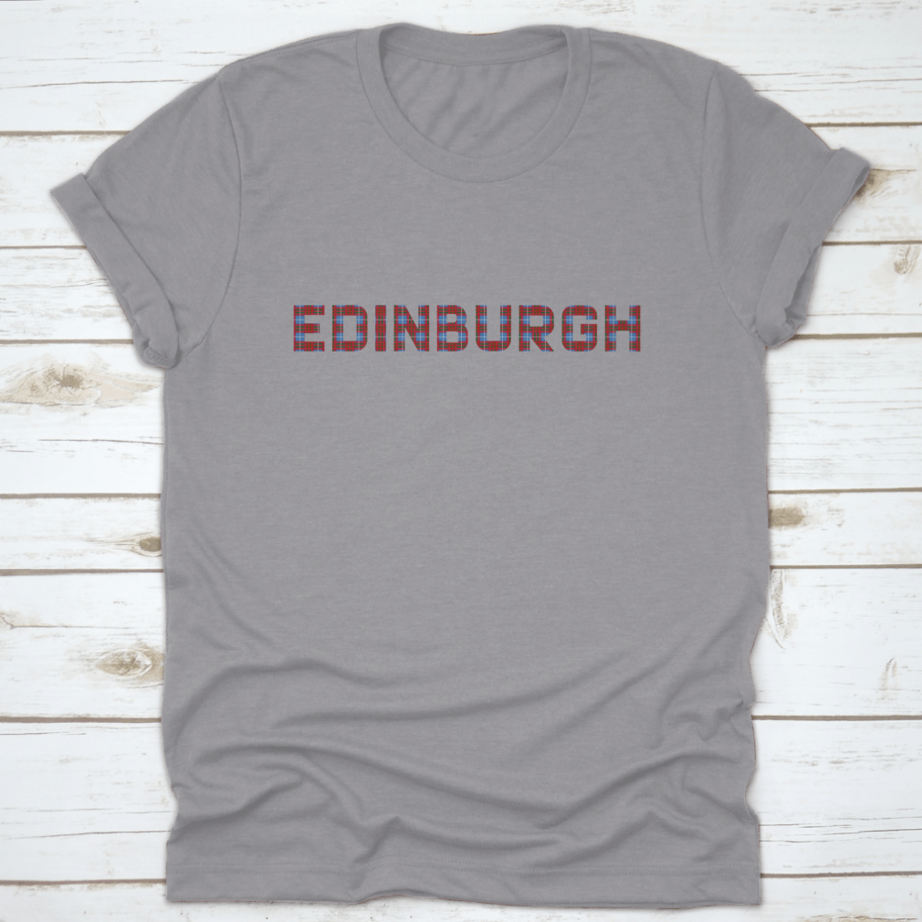 A stylish shirt featuring the word 'Edinburgh' in letters inspired by the Edinburgh tartan, showcasing vibrant colors and a comfortable fit.