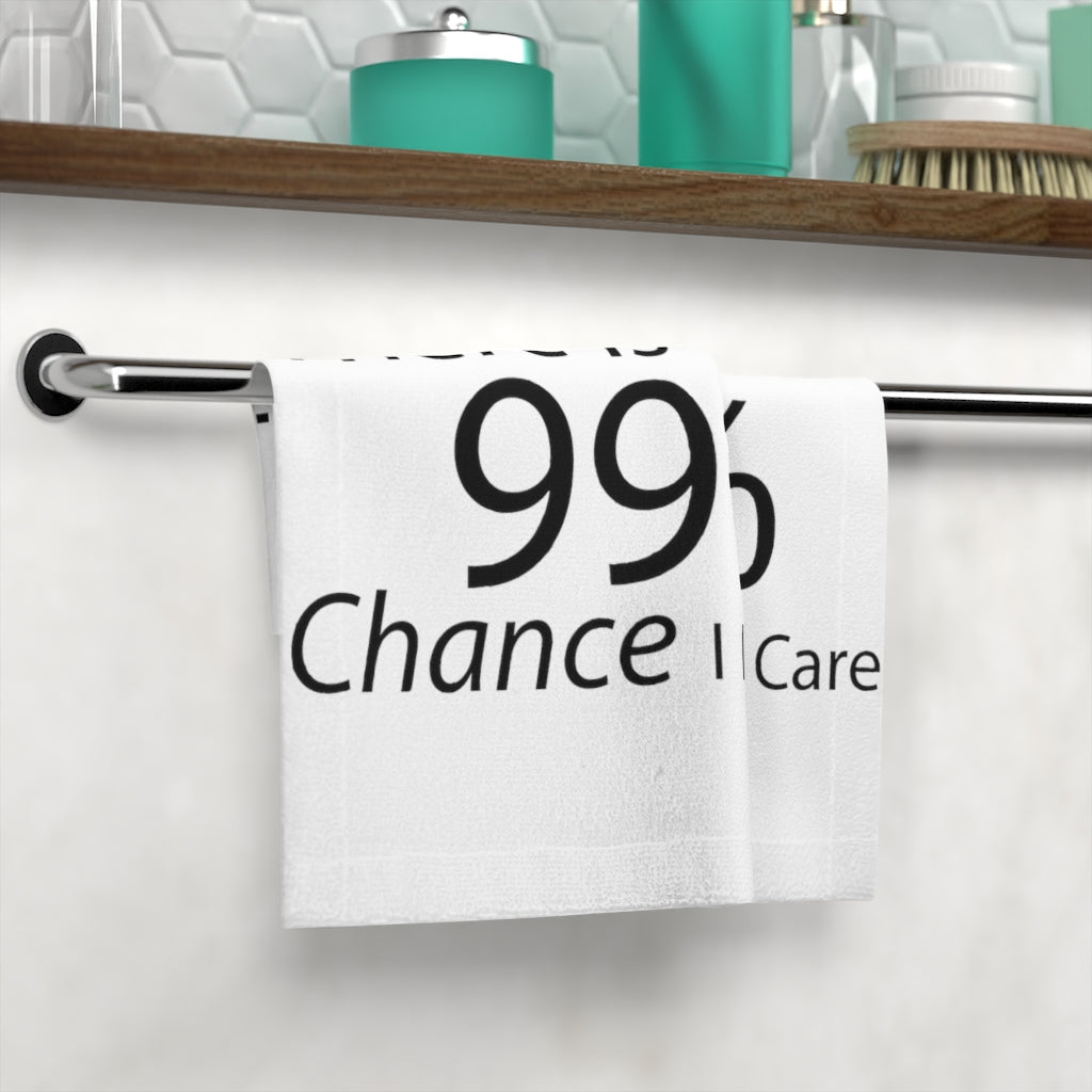 Custom face towel featuring the phrase 'There is a 99% Chance I Don't Care', made of polyester blend and soft cotton, perfect for personal expression.