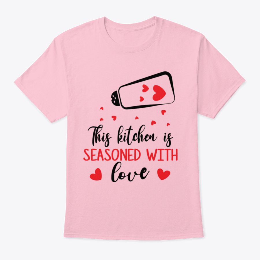 A stylish t-shirt featuring the quote 'This Kitchen Is Seasoned With Love', made from soft cotton fabric, perfect for cooking enthusiasts.