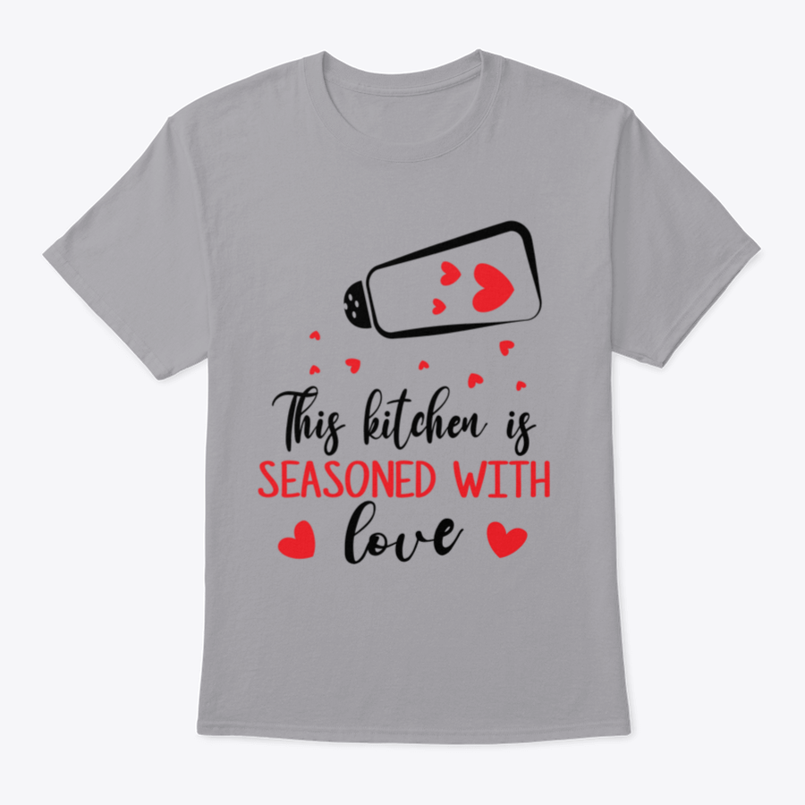 A stylish t-shirt featuring the quote 'This Kitchen Is Seasoned With Love', made from soft cotton fabric, perfect for cooking enthusiasts.