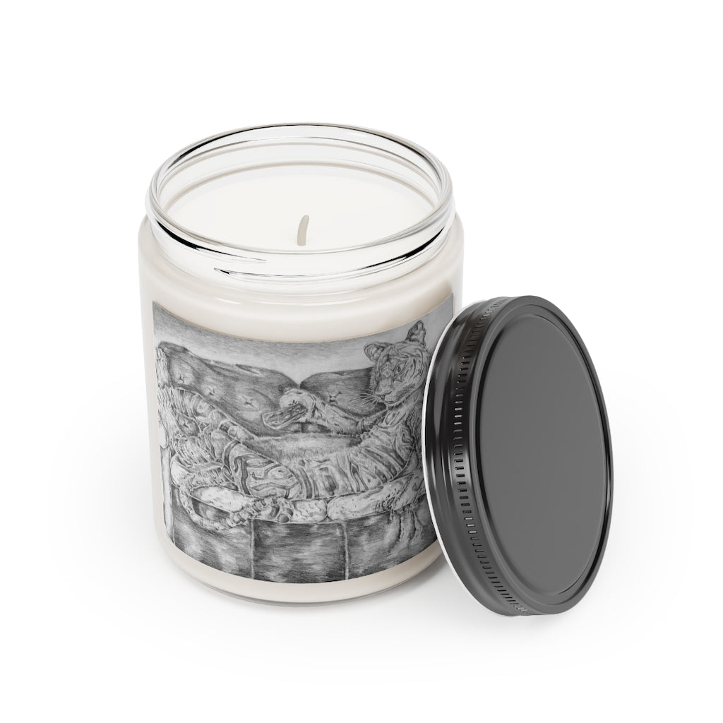 Tiger on a Couch Scented Candle in a glass container, featuring a permanent adhesive label, available in Cinnamon Stick and Vanilla scents.