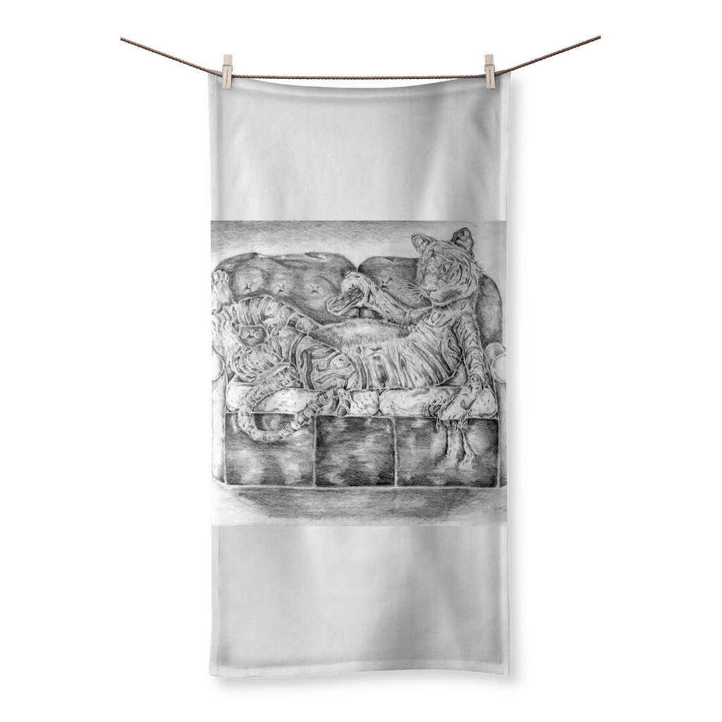 A vibrant towel featuring a tiger lounging on a couch, showcasing a colorful sublimation print on one side and soft cotton backing on the other.