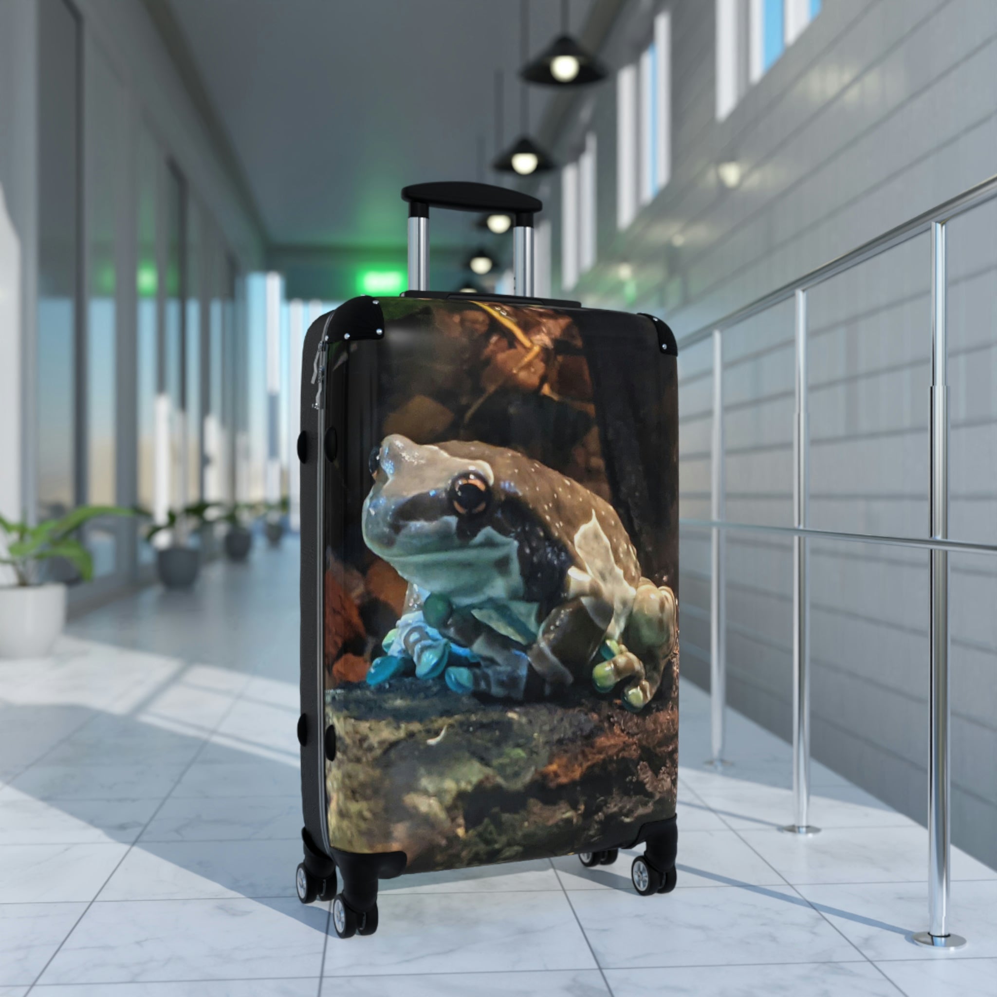 Toad Cabin Suitcase featuring a personalized design, lightweight polycarbonate front, and ABS back, with adjustable handle and 360° swivel wheels.