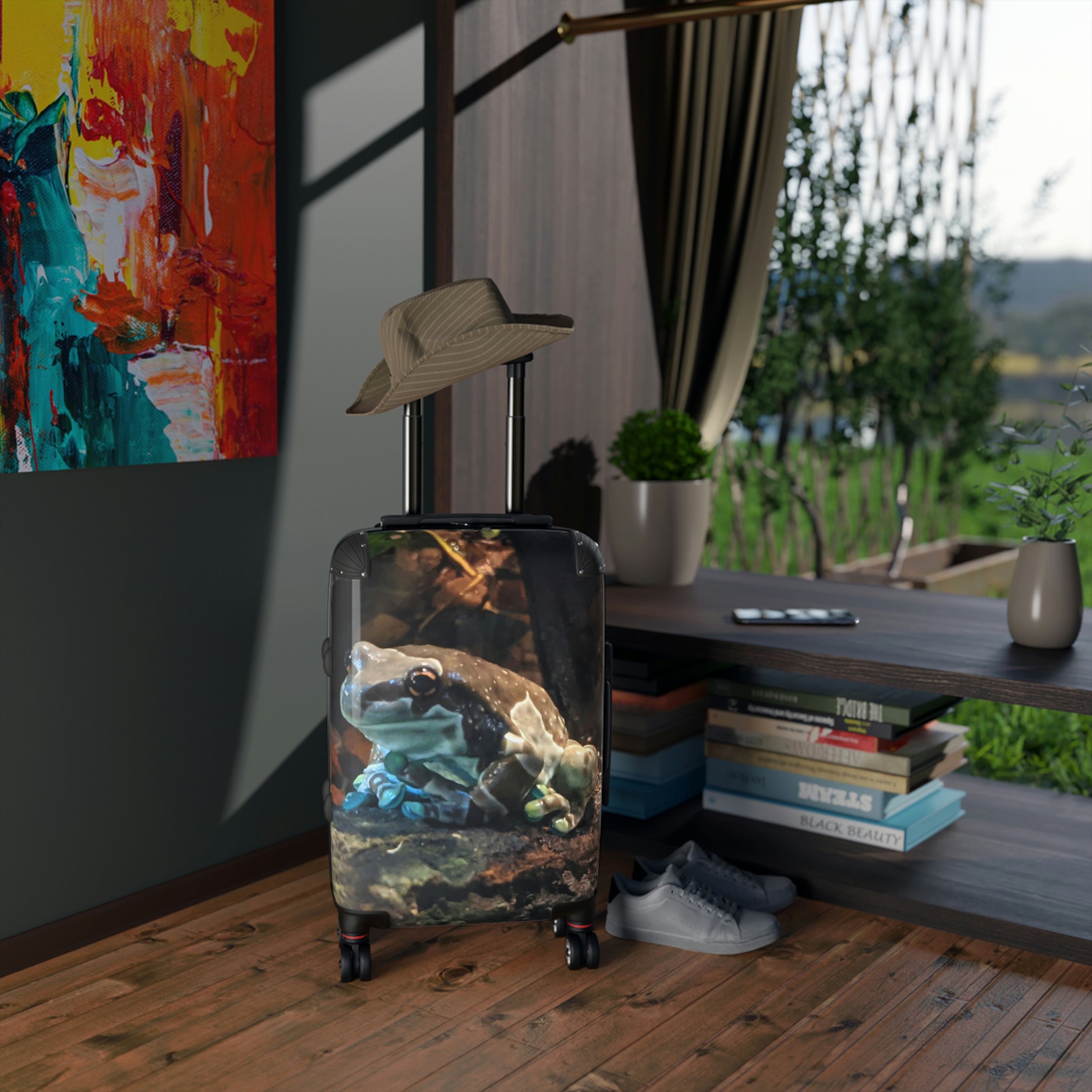 Toad Cabin Suitcase featuring a personalized design, lightweight polycarbonate front, and ABS back, with adjustable handle and 360° swivel wheels.