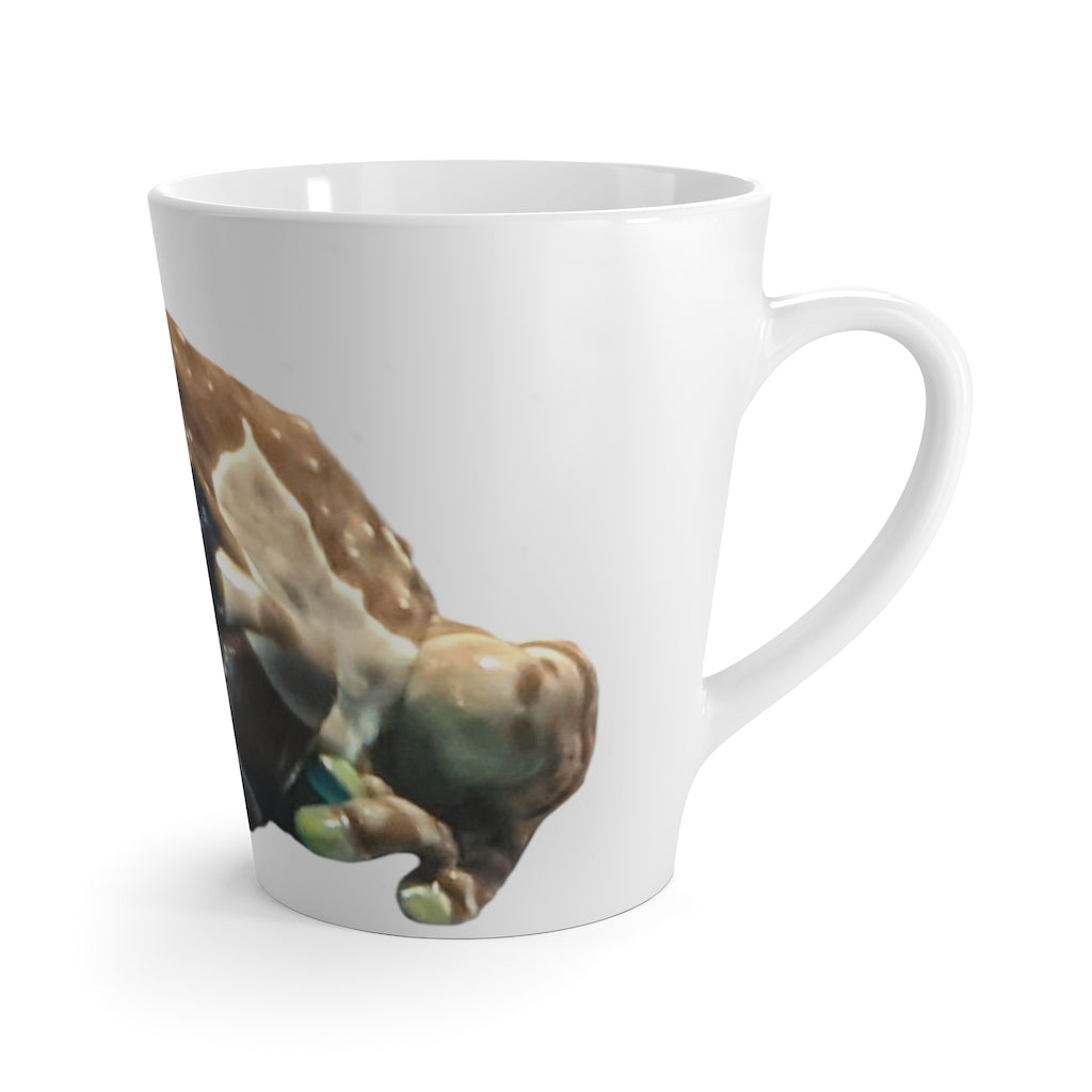 A stylish Toad Latte Mug made of durable white ceramic with a C-handle, perfect for enjoying lattes.