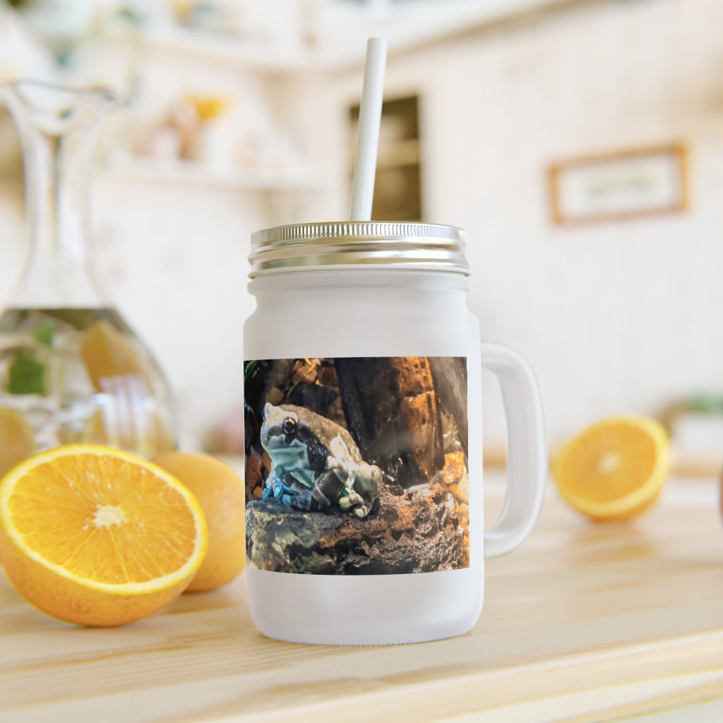 A stylish Toad Mason Jar made of frosted glass, featuring a straw and lid, perfect for personalized drinks.