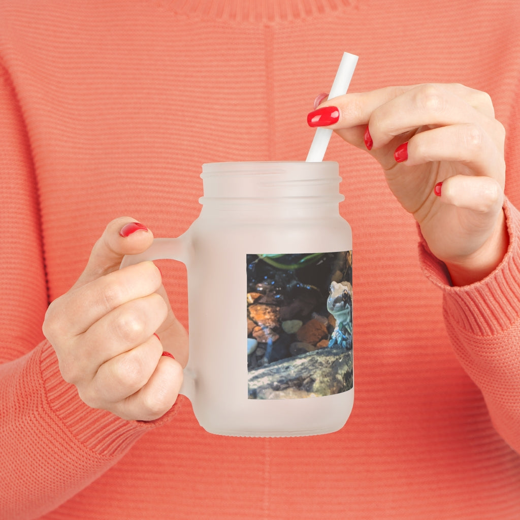 A stylish Toad Mason Jar made of frosted glass, featuring a straw and lid, perfect for personalized drinks.