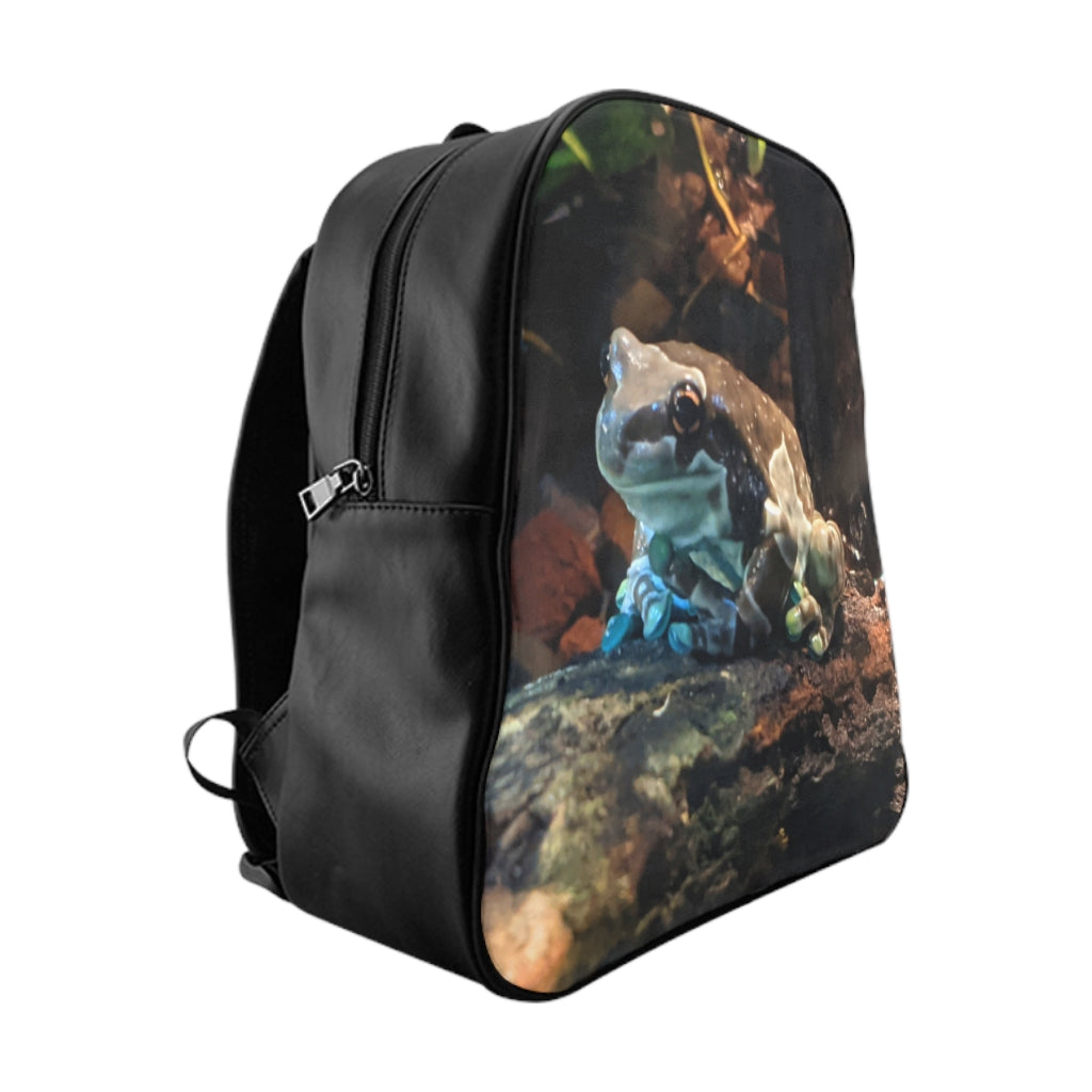 Toad School Backpack made of 100% PU leather with chocolate brown lining and padded back, featuring stylish print and inside pockets.