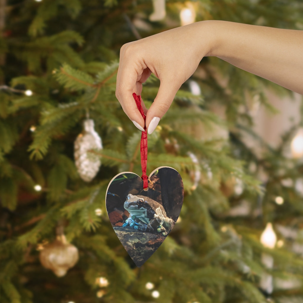 Toad Wooden Christmas Ornaments in various whimsical shapes, featuring a rustic wooden finish and red hanging ribbons.