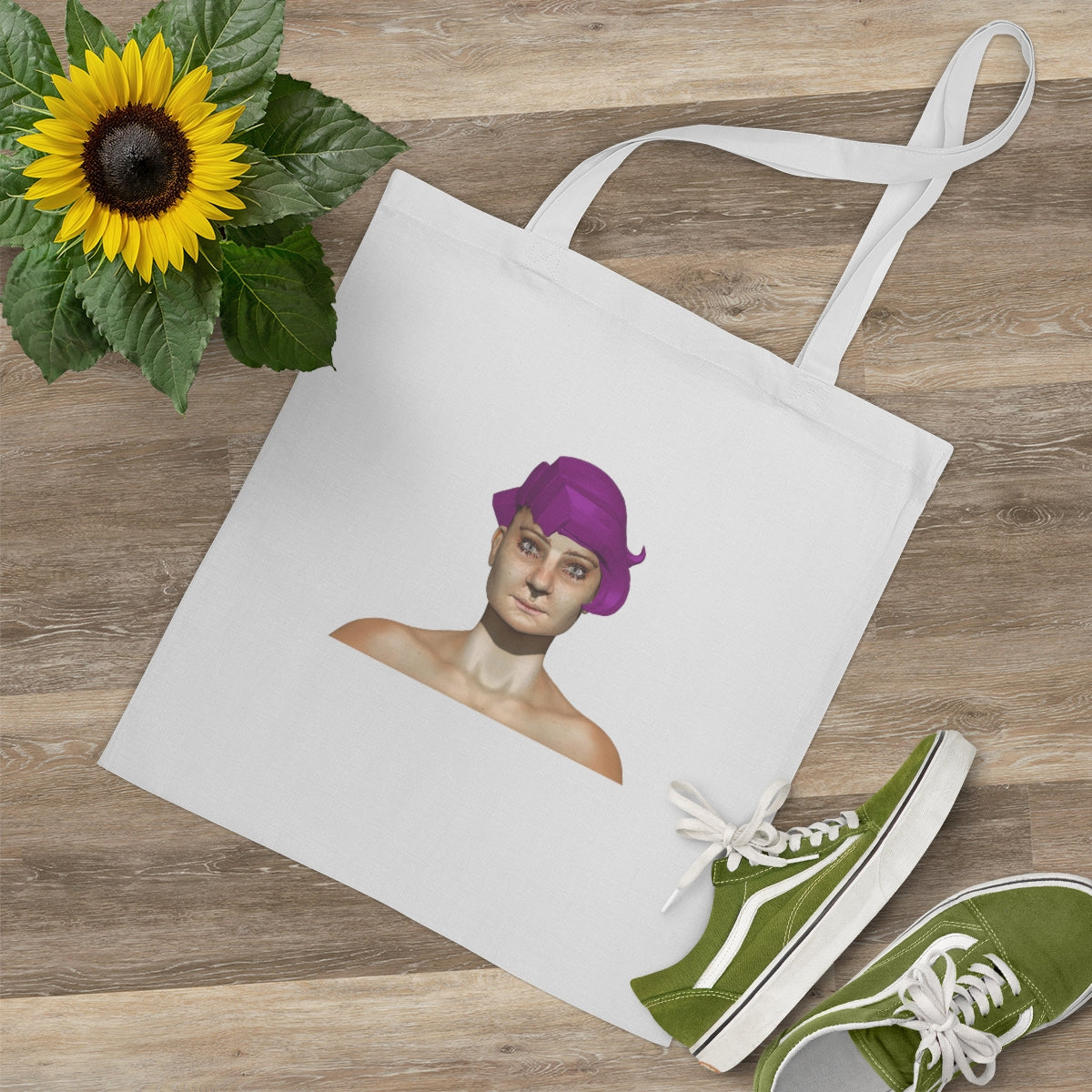 A colorful cotton tote bag with long handles and cross-stitched detailing, perfect for carrying groceries or personal items.