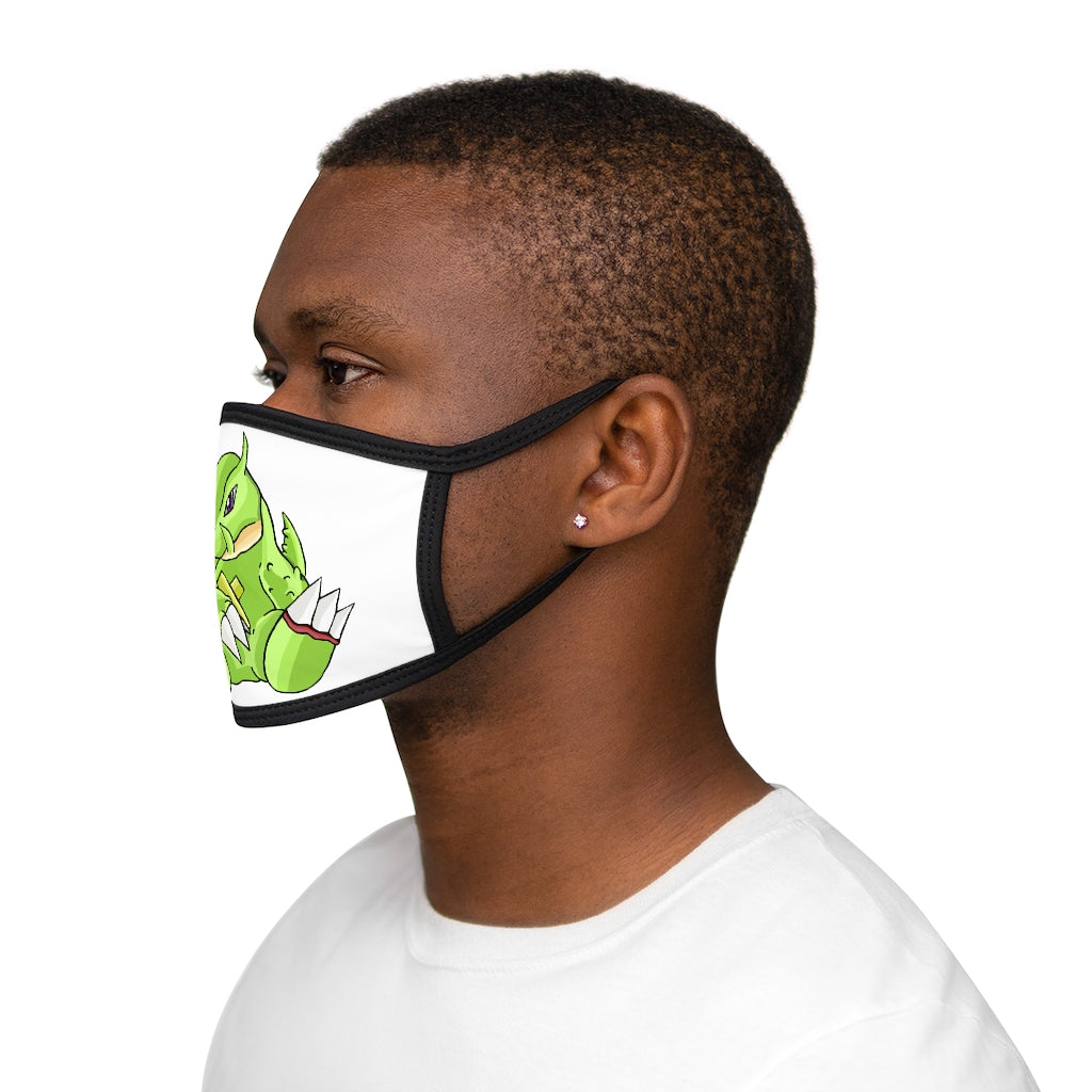 Toxcana Mixed-Fabric Face Mask featuring a black outer edge and earloops, with a soft cotton interior for comfort.