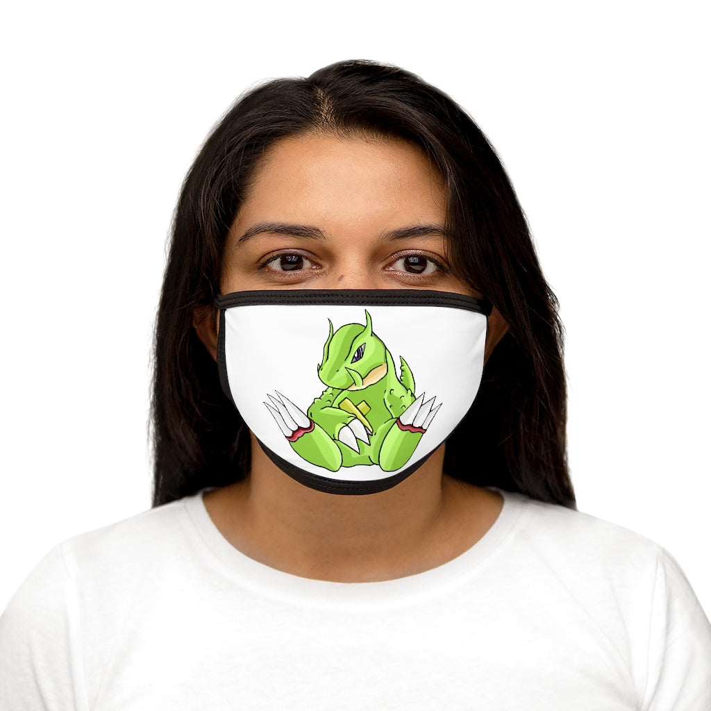 Toxcana Mixed-Fabric Face Mask featuring a black outer edge and earloops, with a soft cotton interior for comfort.