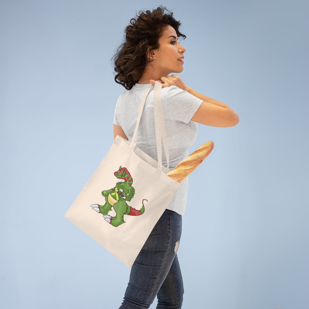 Toxicaan Tote Bag made of 100% cotton with long handles and cross stitching, available in multiple colors.