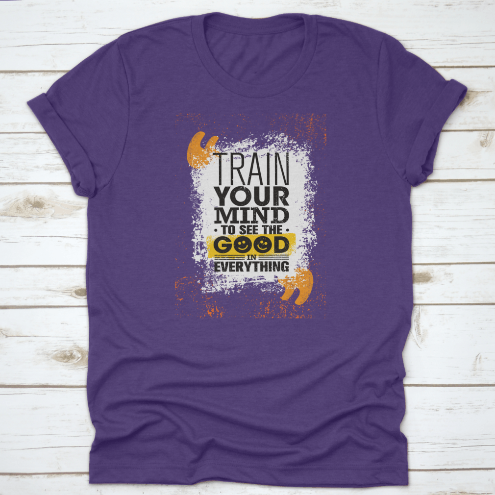 A comfortable cotton t-shirt featuring the inspiring phrase 'Train Your Mind To See The Good In Everything' in a stylish design.