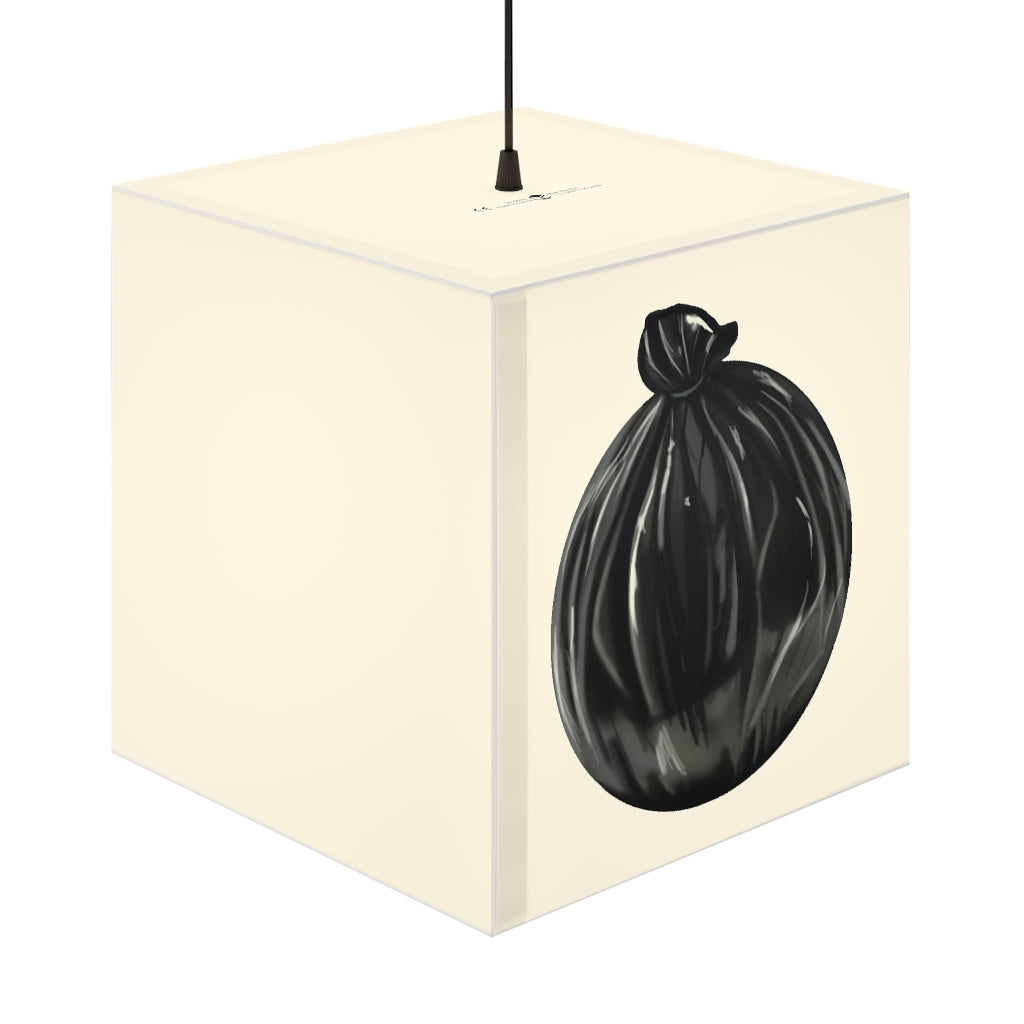 A stylish Trash Bag Personalized Lamp in a cube shape, showcasing unique designs, perfect for indoor decoration.