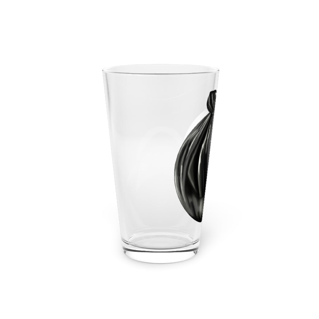 A clear 16oz Trash Bag Pint Glass showcasing a custom printed design, perfect for beverages.