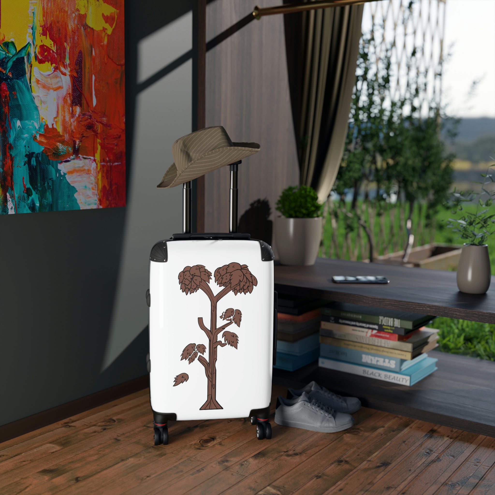 Tree Cabin Suitcase with personalized design, showcasing its polycarbonate shell and adjustable handle.