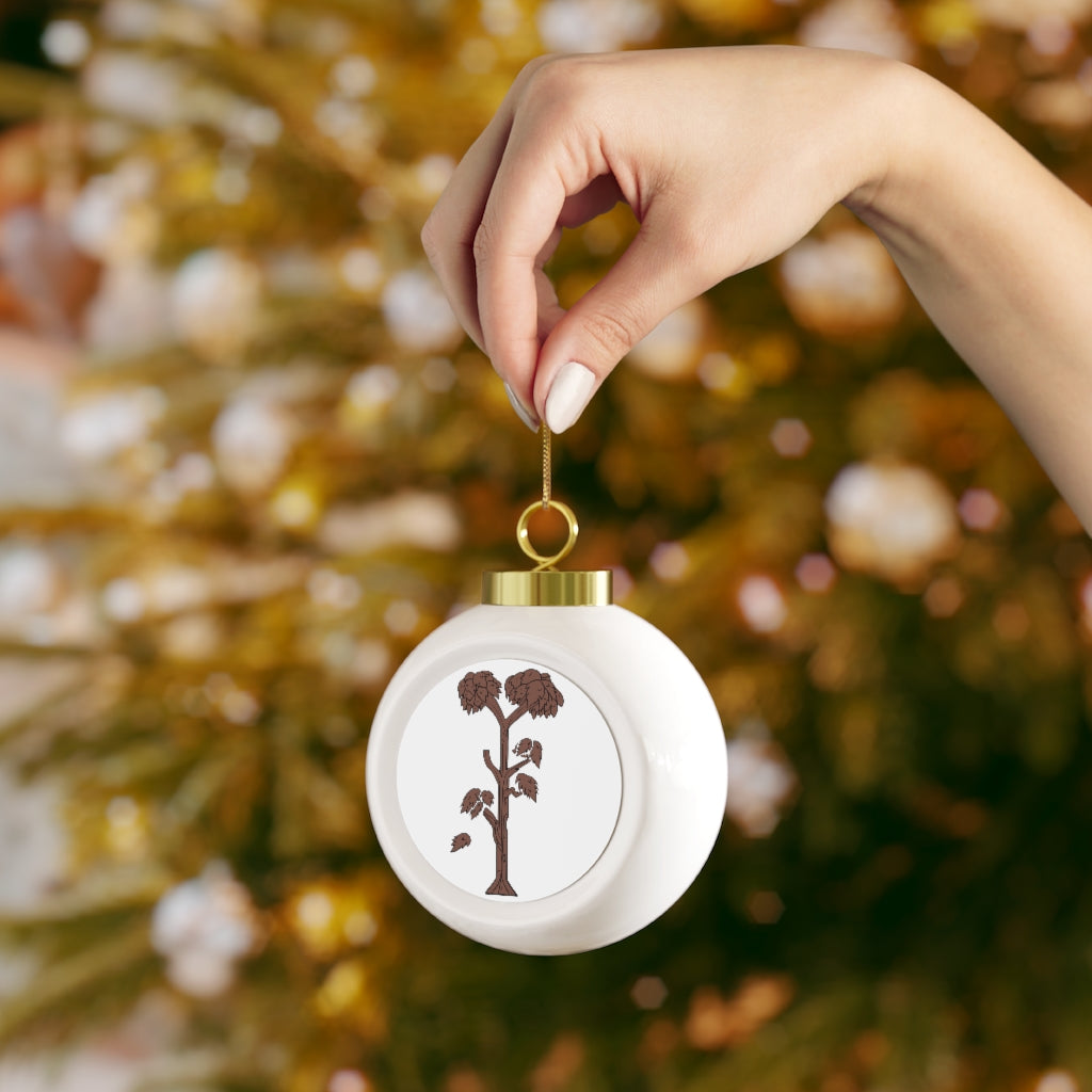 A 3-inch ceramic Christmas ball ornament with a glossy finish, featuring a gold ribbon for hanging and a vintage style design.