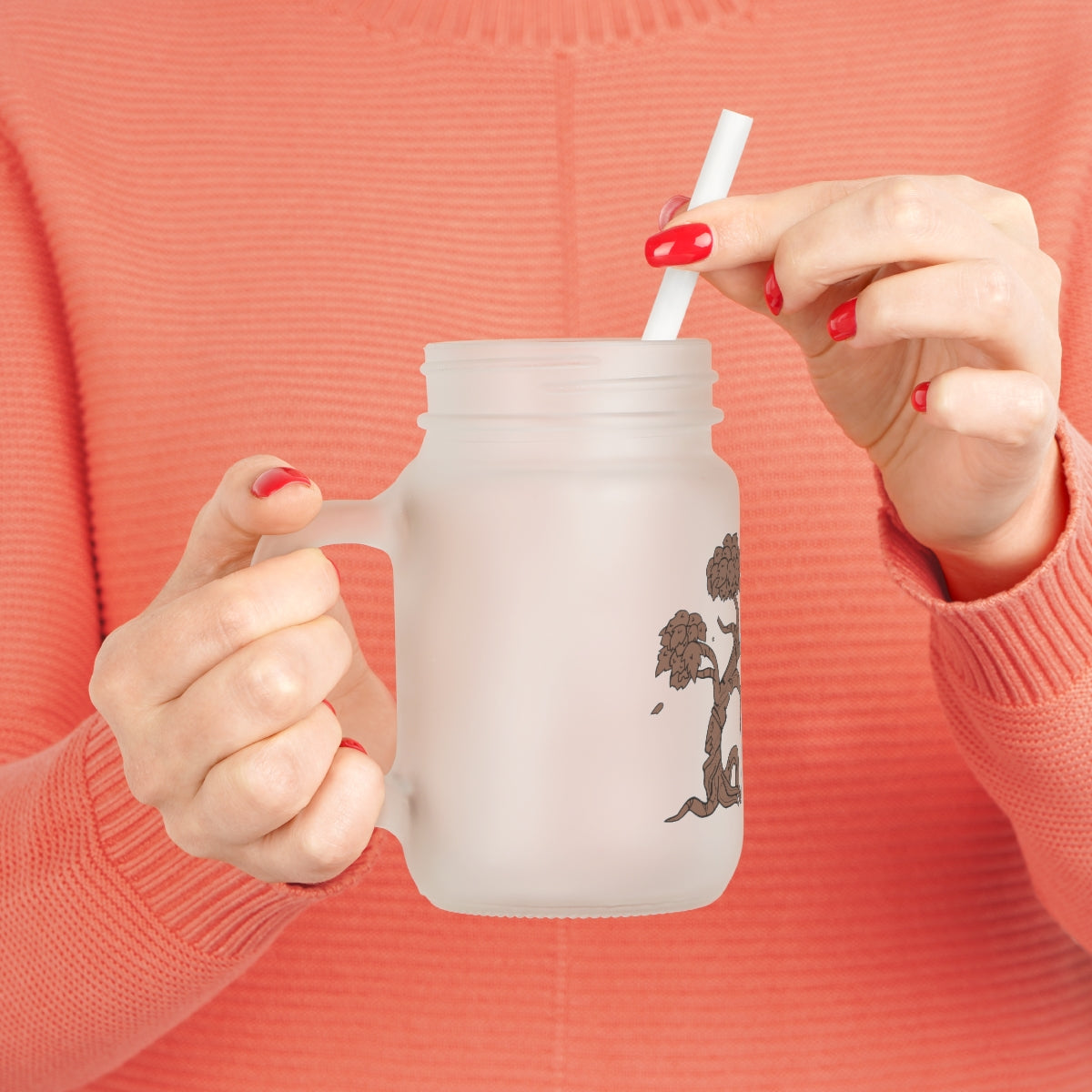 A personalized Tree Mason Jar made of frosted glass, featuring a straw and lid, perfect for drinks like lemonade and cocktails.