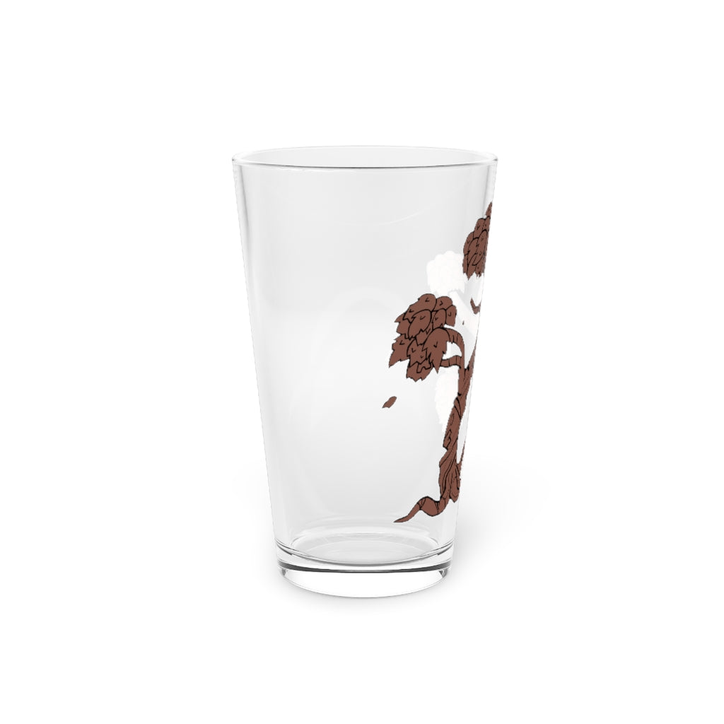 A clear 16oz Tree Pint Glass showcasing a customizable design, perfect for beverages and gifting.