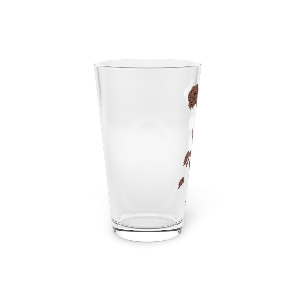 A clear 16oz Tree Pint Glass showcasing a customizable design, perfect for beverages.