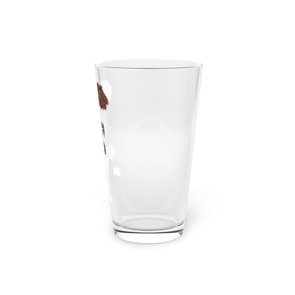 A clear 16oz Tree Pint Glass showcasing a customizable design, perfect for beverages.