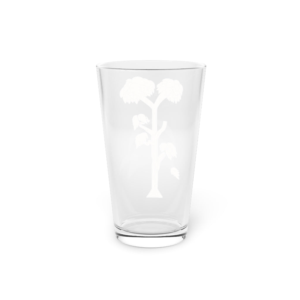 A clear 16oz Tree Pint Glass showcasing a customizable design, perfect for beverages.